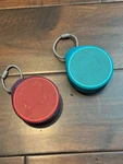 2 Logitech X100 Mobile Portable Wireless Bluetooth Speaker Orange / Turquoise. Fixed Price $49.99.