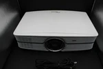Optoma UHD60 Home Theater Projector - White. Fixed Price $649.95.
