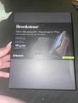 Brookstone Mini Bluetooth Keyboard Pro With Leather Case For Ipad Tablet.. Fixed Price $35.00.